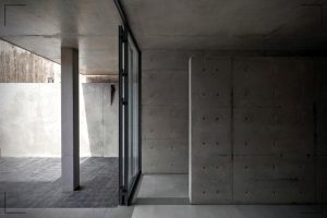 Diseño de una pequeña casa con fachada de concreto - Construcciones