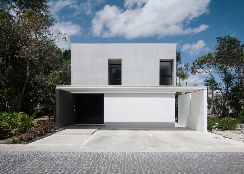 Casa Minimalista de dos pisos, diseño de Fachada simple y colores acorde 1