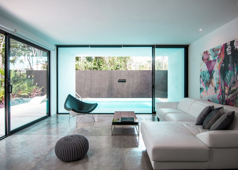 Casa Minimalista de dos pisos, diseño de Fachada simple y colores acorde 5
