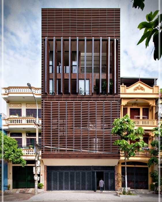 Diseño de una casa tropical con fachada de madera - Ideas asombrosas